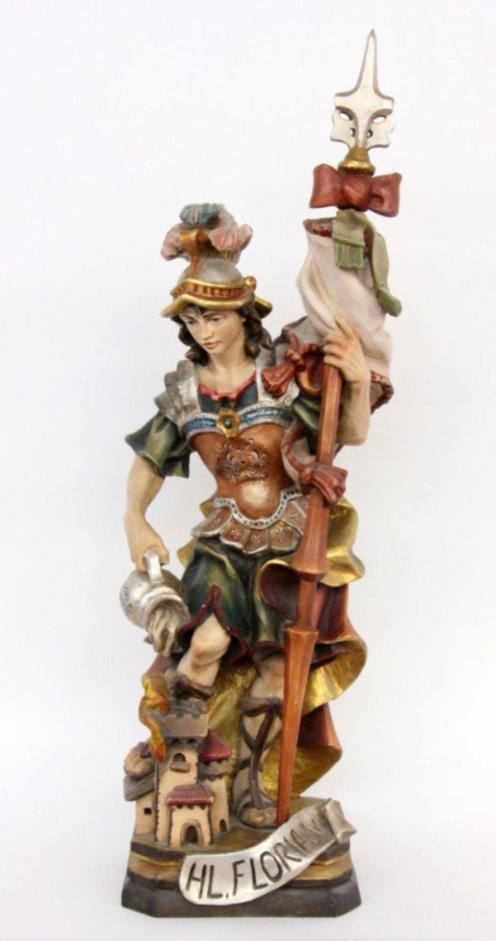 SAINT FLORIAN Alpine, 20th century Wooden sculpture, carved and painted in colour. 106 cm
