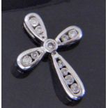 A CROSS PENDANT 585/000 white gold with diamonds. 20 mm long, gross weight approx. 1.6