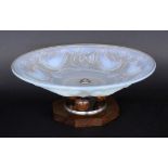 AN ART DECO CENTREPIECEFrance, 1920s Light-blue opalescent glass with relief decoration of birds and