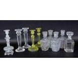 A LOT OF 11 CANDLESTICKS AND BOTTLES, glass. Keywords: glassware, decorative item,