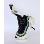 A SPANISH DANCER 1920s Glazed and painted Art Deco ceramic figure. Impressed number:
