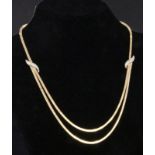 A NECKLACE, 2 strands. 750/000 yellow gold. 41.5 cm long, approx. 39 grams. Keywords: