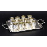 A TRAY WITH 12 LOTS OF CUPSSilver-plated metal. Tray approx. 22 x 18 cm. Keywords: varia,