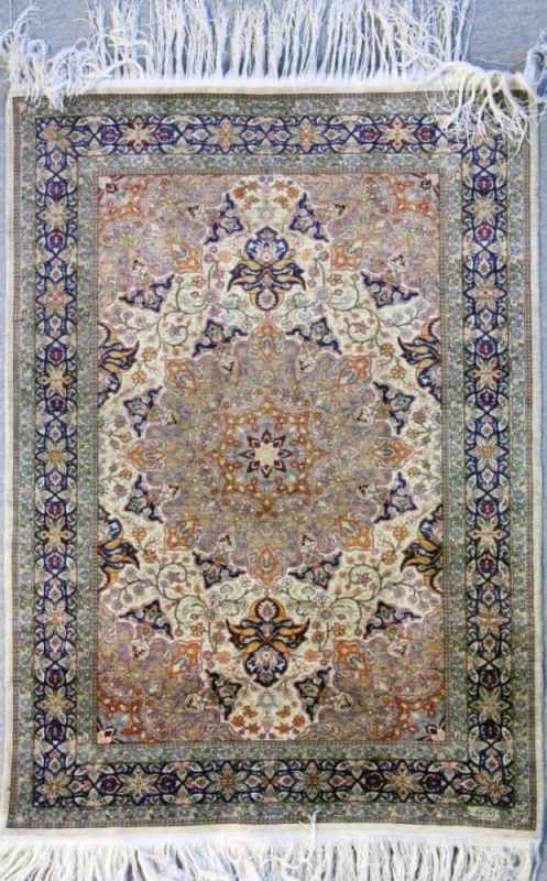 A TURKISH HEREKE SILK RUG with Hereke pattern. Silk on silk, double knots, 14 x 14 cm =