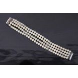 A PEARL BRACELET, 4 strands with beautiful Akoya pearls of approx. 6 mm. 585/000 white