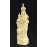 AN IVORY MADONNA France, 19th century Finely carved Madonna and Child made of ivory. In a
