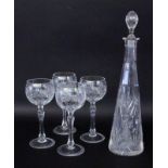 A LOT OF 4 WINE GLASSES Crystal glass with cut decoration. 20 cm high. Includes a crystal