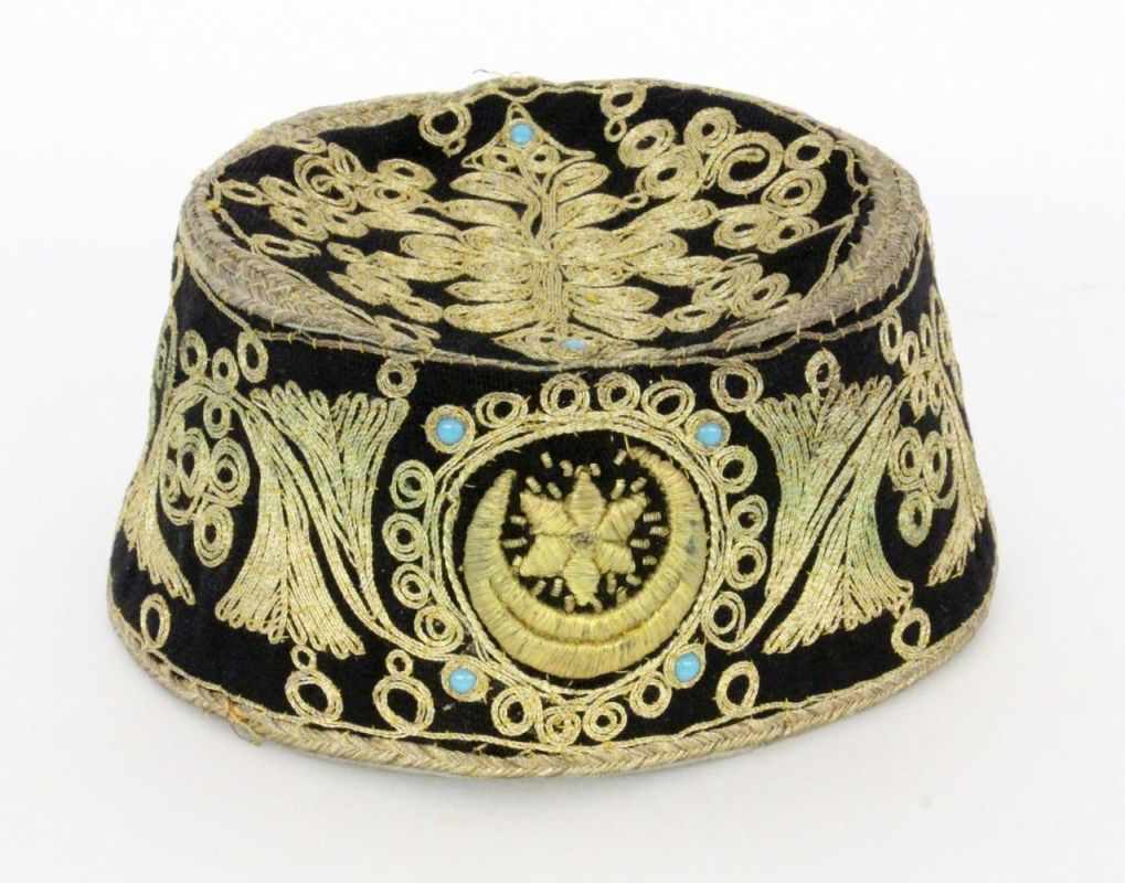 A TAQIYAH Traditional Arab headdress. Felt embroidered with gold brocade and