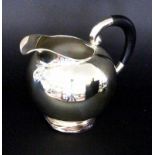 A JUG Gebr. Deyhle, Schwabisch Gmund Silver 830/000 with ebonized wooden handle.