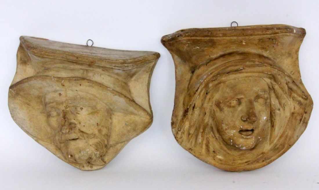 TWO MASCARONS Plaster. 24 cm high. Includes a plaster relief. Keywords: miscellaneous