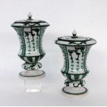 A PAIR OF FIREPLACE VASES WITH LIDS circa 1900 Faience, painted in green. Unknown