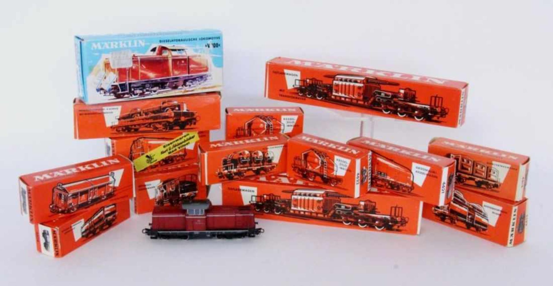 A LOT OF MARKLIN H0 RAILWAYS Diesel locomotive 3072 and 13 freight cars. Keywords: toys,