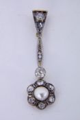 AN ART DECO PENDANT 585/000 yellow and white gold with pearl and 13 old-cut diamonds