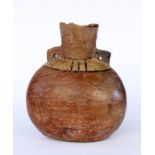 AN ANTIQUE HANDLED VASE probably China, Zhou Dynasty circa 1000 BC Brown ceramic with