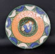 AN EVA FRITZ-LINDNER WALL PLATE Karlsruhe Maiolica 1981 Reddish earthenware with coloured