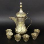 AN ORIENTAL TEAPOT WITH 6 CUPS Silver-plated brass. 30 cm high. Wear and tear. Keywords: