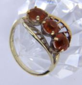 A LADIES RING 585/000 yellow gold with 3 Madeira citrines. Ring size 58, gross weight