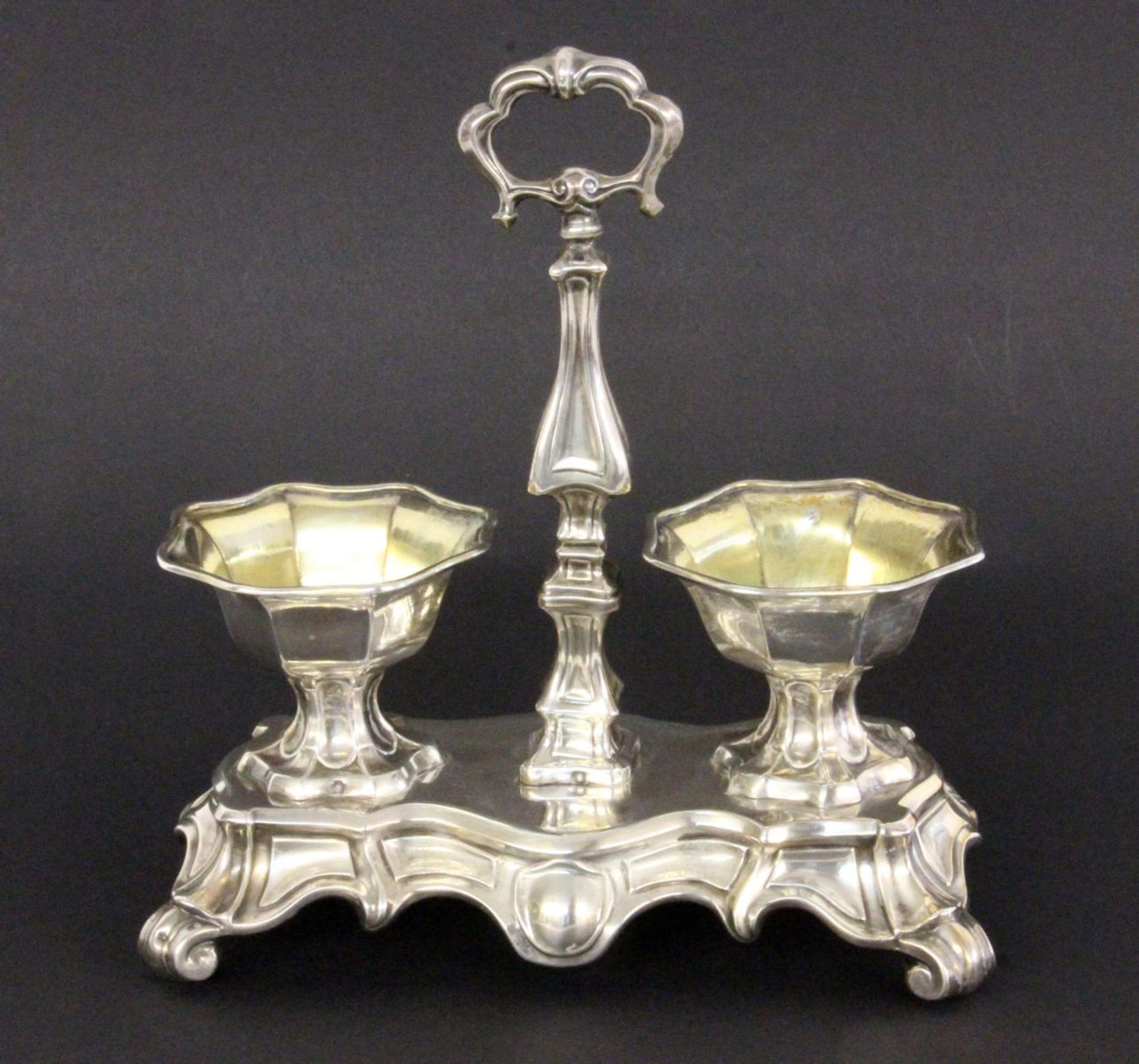 SALIERE France, 19th century silver. Baroque style with a central handle and 2octagonal spice b