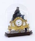 A FIGURINE PENDULUM CLOCK WITH GLASS DOME France, 19th century Gold-painted metal case with