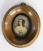 A MINIATURE 20th century Portrait of a Lady. Gouache on ivory. Signed. 4 x 3 cm, framed.