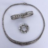 A NECKLACE AND BROOCH Silver with sapphires. Gross weight approx. 38 grams. Keywords: