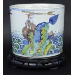 A CACHEPOT China, probably Qing dynasty Porcelain with polychrome painting, representationof the