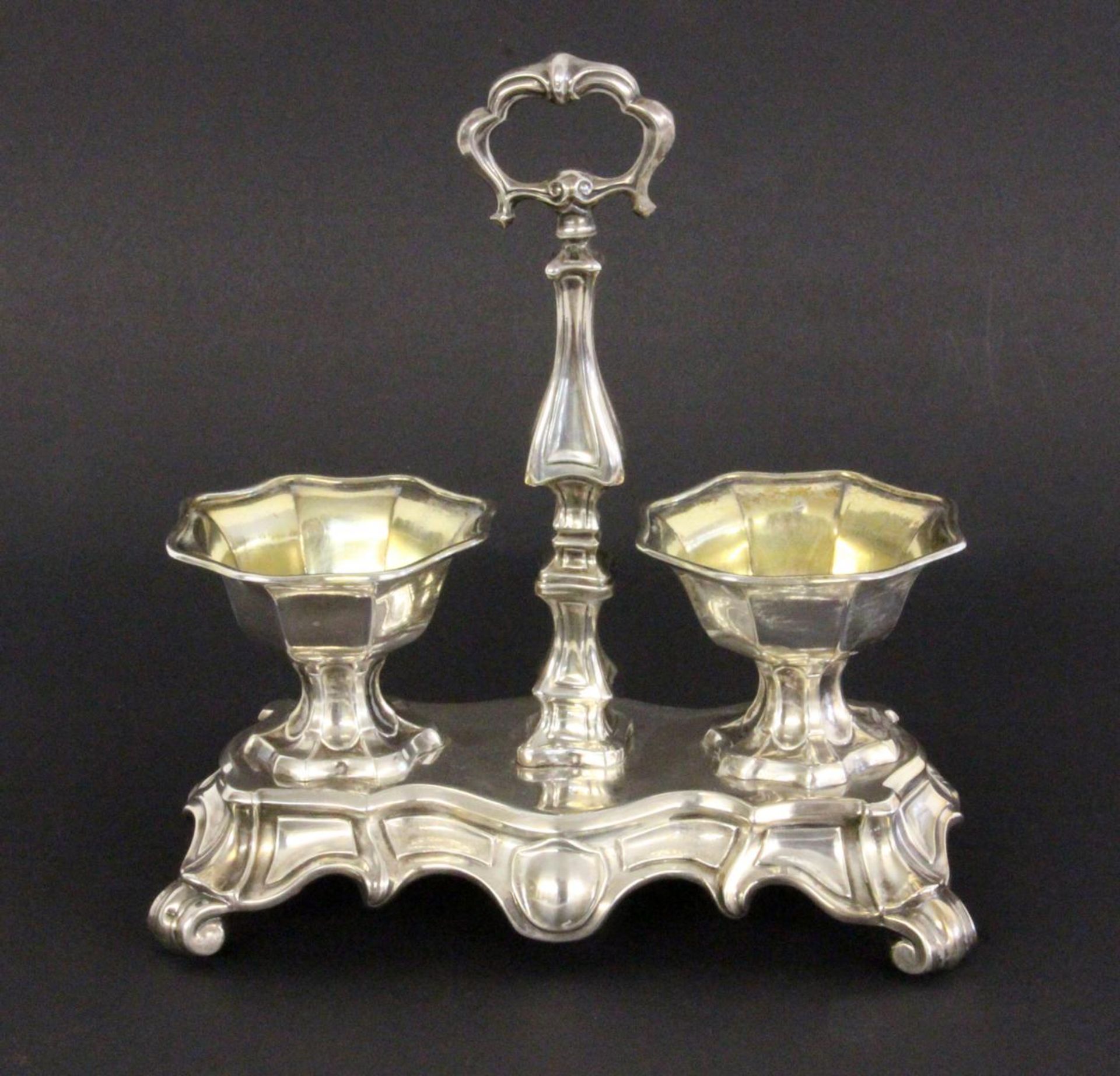 SALIERE France, 19th century silver. Baroque style with a central handle and 2octagonal spice
