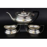 A QUEEN ELIZABETH II TEA SERVICE England 1987 3-piece service, silver-plated, with mounted