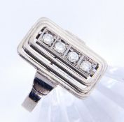 AN ART DECO LADIES RING 1920s 750/000 white gold with 4 diamonds. Ring size 57, gross