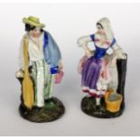 AN ITALIAN PEASANT COUPLE circa 1900 2 colourfully decorated porcelain figures. 11.5 cm