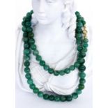 AN AVENTURINE NECKLACE Diameter 7 - 11 mm, gradient. 63 cm long. Keywords: jewellery,