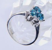 A LADIES RING 585/000 yellow gold with 3 blue zircons. Ring size 56, gross weight approx.