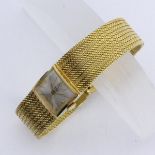 A BWC LADIES WRISTWATCH Switzerland 585/000 yellow gold with Milanese mesh watch strap.