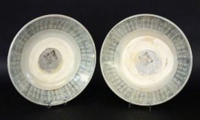 TWO CERAMIC PLATES China, probably Ming dynasty Round shape, partially glazed with blue