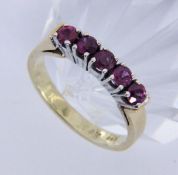 A LADIES RING 585/000 yellow gold with 5 rubies. Ring size 55, gross weight approx. 4