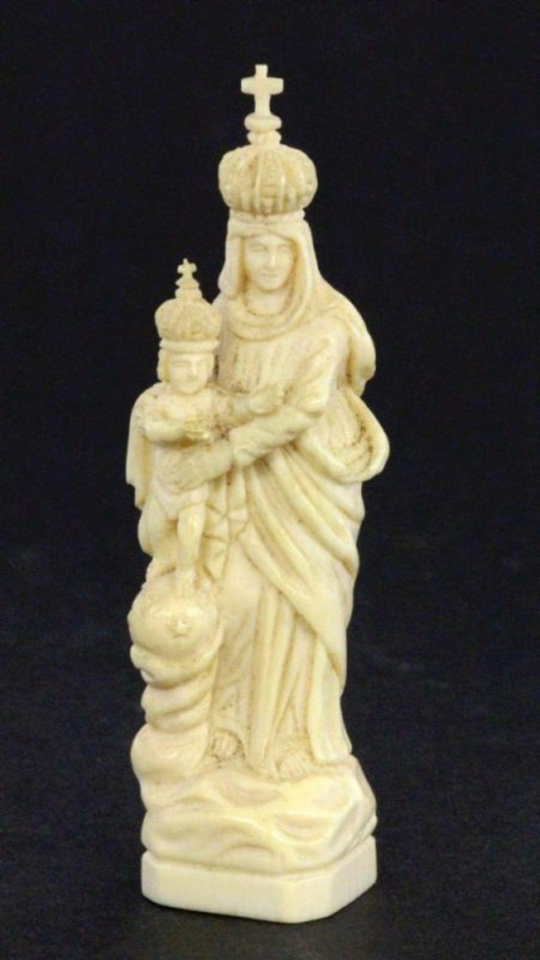 AN IVORY MADONNA France, 19th century Finely carved Madonna and Child made of ivory. In a