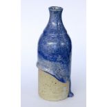 RENATE & HANS HECKMANN Schwabisch Hall Glazed stoneware bottle with thick blue drip glaze. Impressed