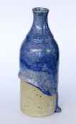 RENATE & HANS HECKMANN Schwabisch Hall Glazed stoneware bottle with thick blue drip glaze. Impressed