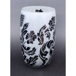 A CAMEO VASE Colorless glass with black overlay and etched relief decoration all around. 25 cm high.