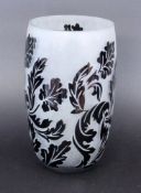 A CAMEO VASE Colorless glass with black overlay and etched relief decoration all around. 25 cm high.