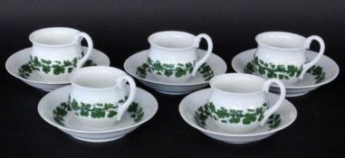 A SET OF 5 CUPS WITH SAUCERS Meissen circa 1900 Green vine leaves decoration, swan