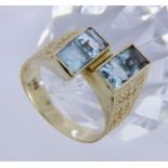 A LADIES RING 585/000 yellow gold and 4 aquamarines. Ring size 57, gross weight approx.