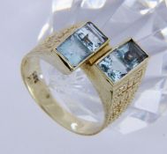 A LADIES RING 585/000 yellow gold and 4 aquamarines. Ring size 57, gross weight approx.