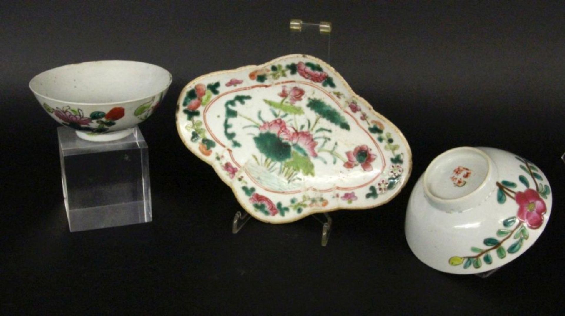 THREE BOWLS probably Qing dynasty Porcelain with coloured painted floral decoration. Round