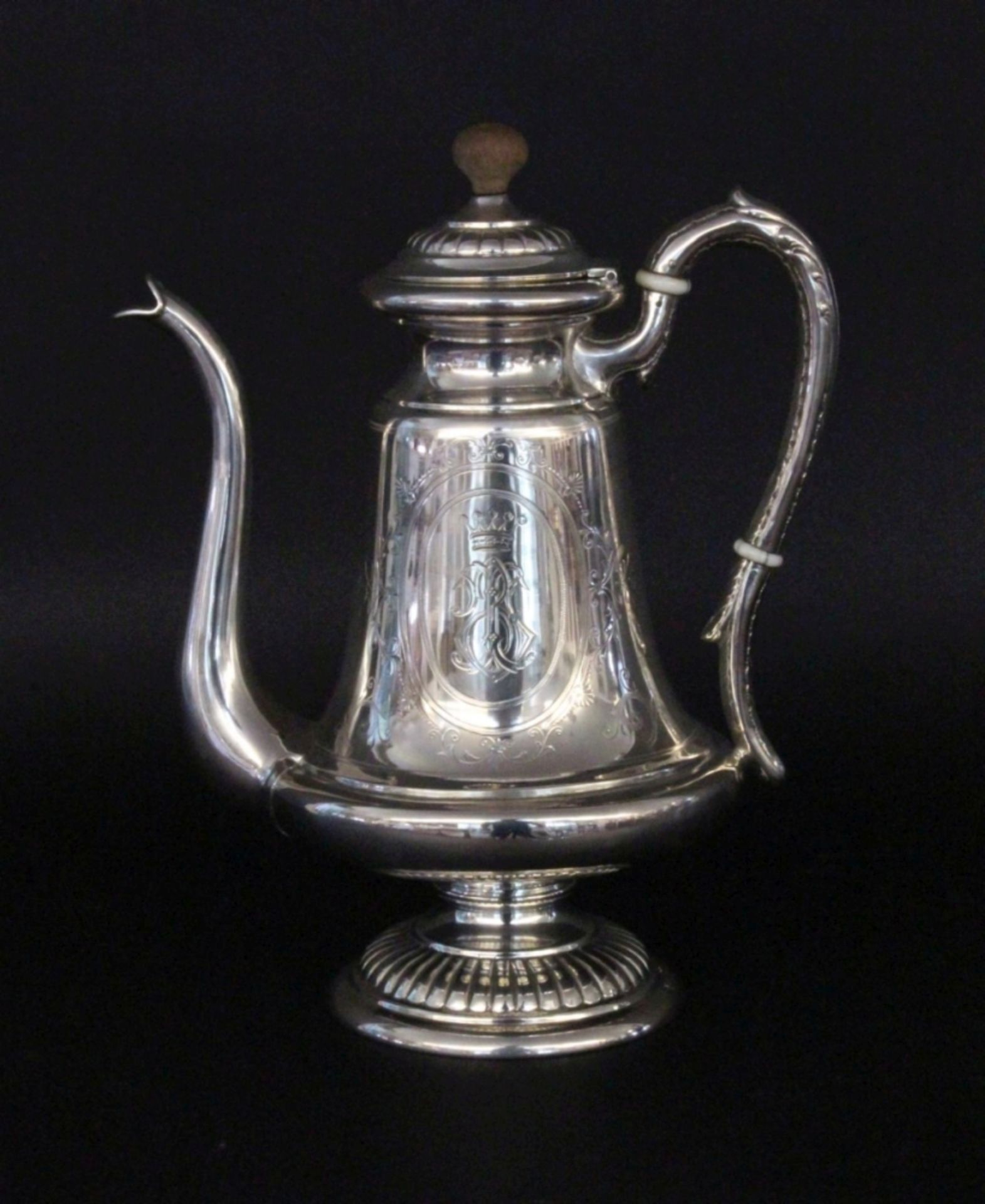 A COFFEE POT 1872 - Vienna - 1922 Chased decoration with crowned monogram. Manufacturer: