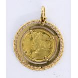 A PENDANT WITH MEDAL ''FREDERICK II'' 750/000 yellow gold. Diameter 3 cm, approx. 8.4 grams.