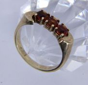 A LADIES RING 585/000 yellow gold with 3 Madeira citrines. Ring size 57, gross weight