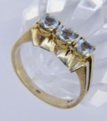 A LADIES RING 585/000 yellow gold and 3 aquamarines. Ring size 57, gross weight approx.