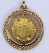 A PENDANT WITH ''NAGOLD'' MEDAL 750/000 yellow gold. Diameter 35 mm, gross weight approx. 10.4