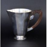 AN ART DECO JUG Silver-plated metal with wooden handle. 17cm high: Keywords: varia, collectibles,